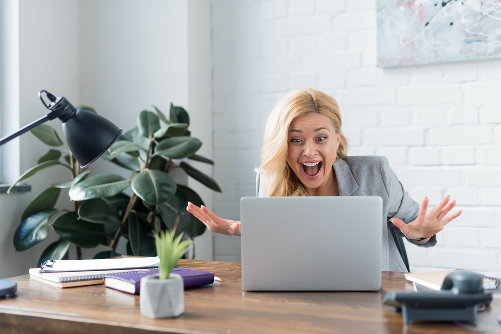 Excited shopper buying online