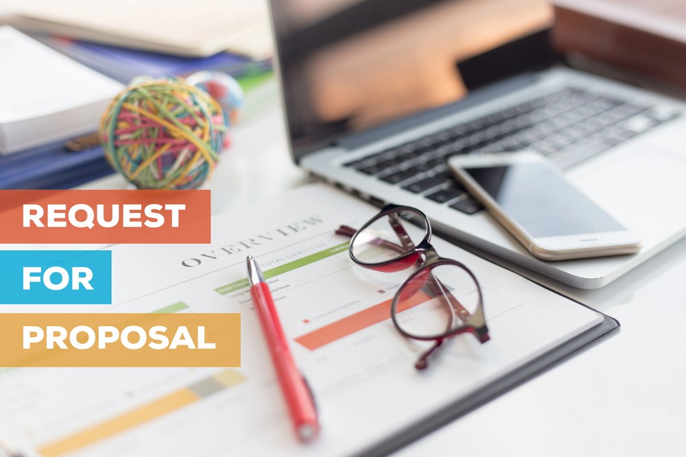 Nonprofit team reviewing website RFP template and planning a website redesign project