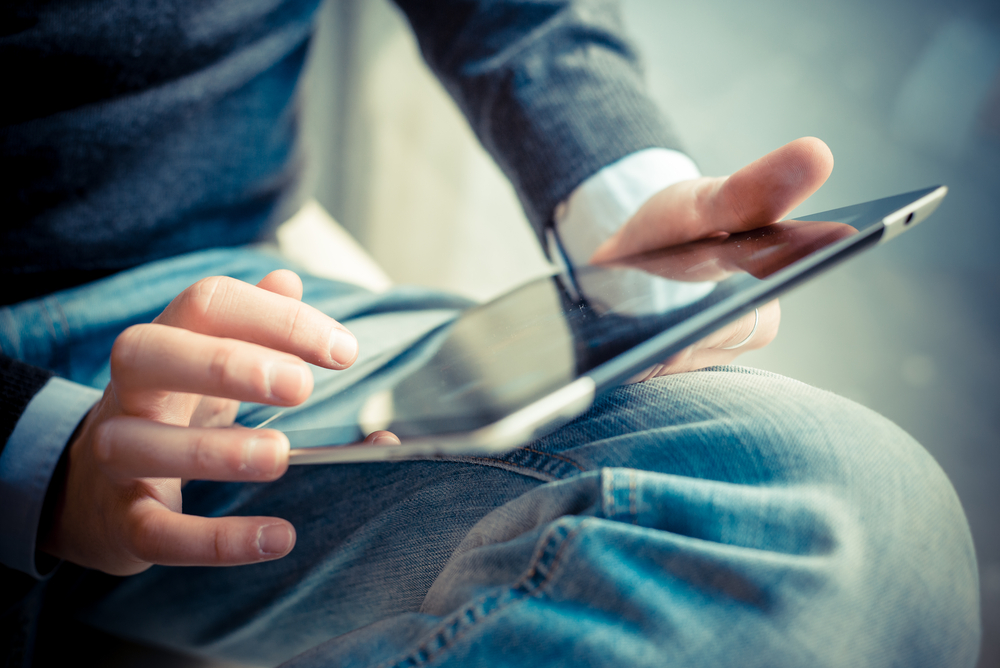 Someone is reading an article on a tablet.