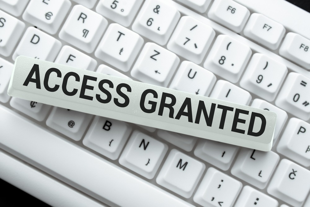 Business owner reviewing website grant opportunities for website development and digital marketing growth
